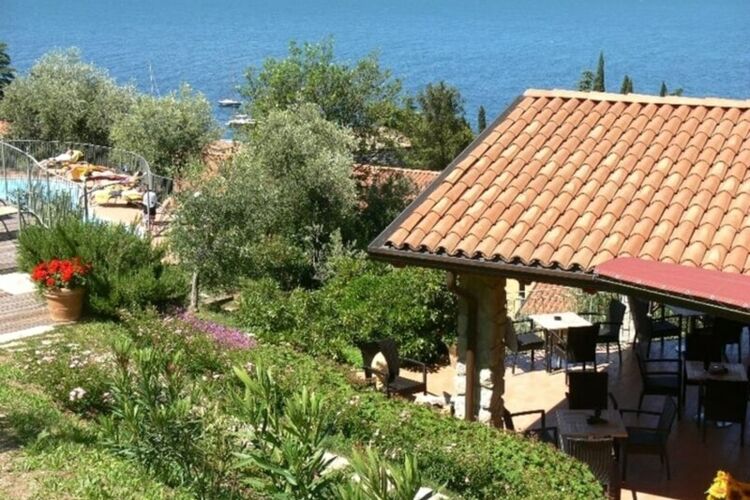 Ferienwohnung Monolocale mit Seeblick im Landgut Ca' del Lago mit Pool