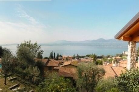 Ferienwohnung Bilocale mit Seeblick im Landgut Ca' del Lago mit Pool